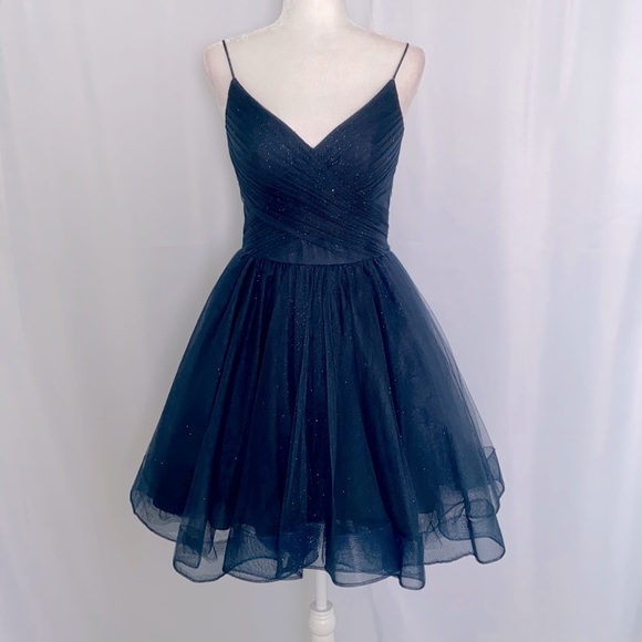 🤩 Glamour by Terani Couture
Sweetheart Neck Glitter Tulle Skirt Dress - Picture 5 of 9